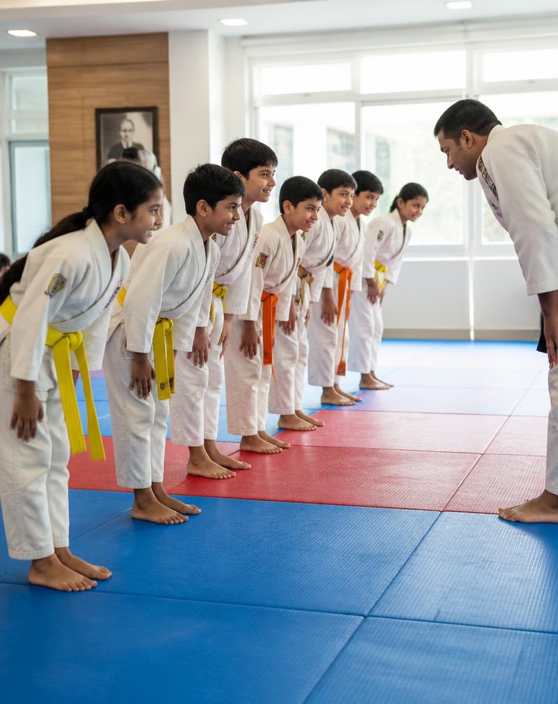 Coach training a child in Kickboxing at The Tumble Gym Sarjapur